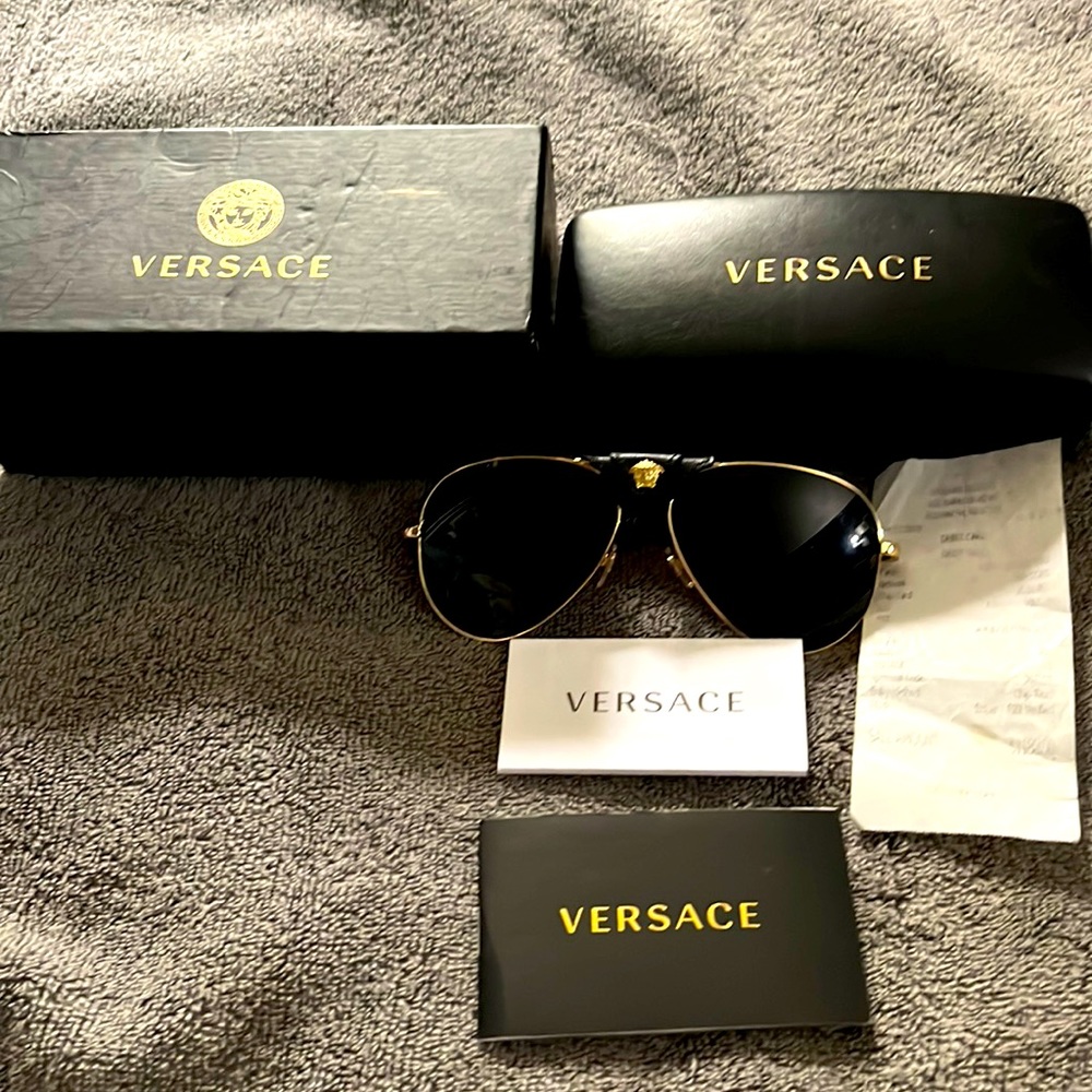Brand-new Versace sunglasses in box case & receipt of purchase..